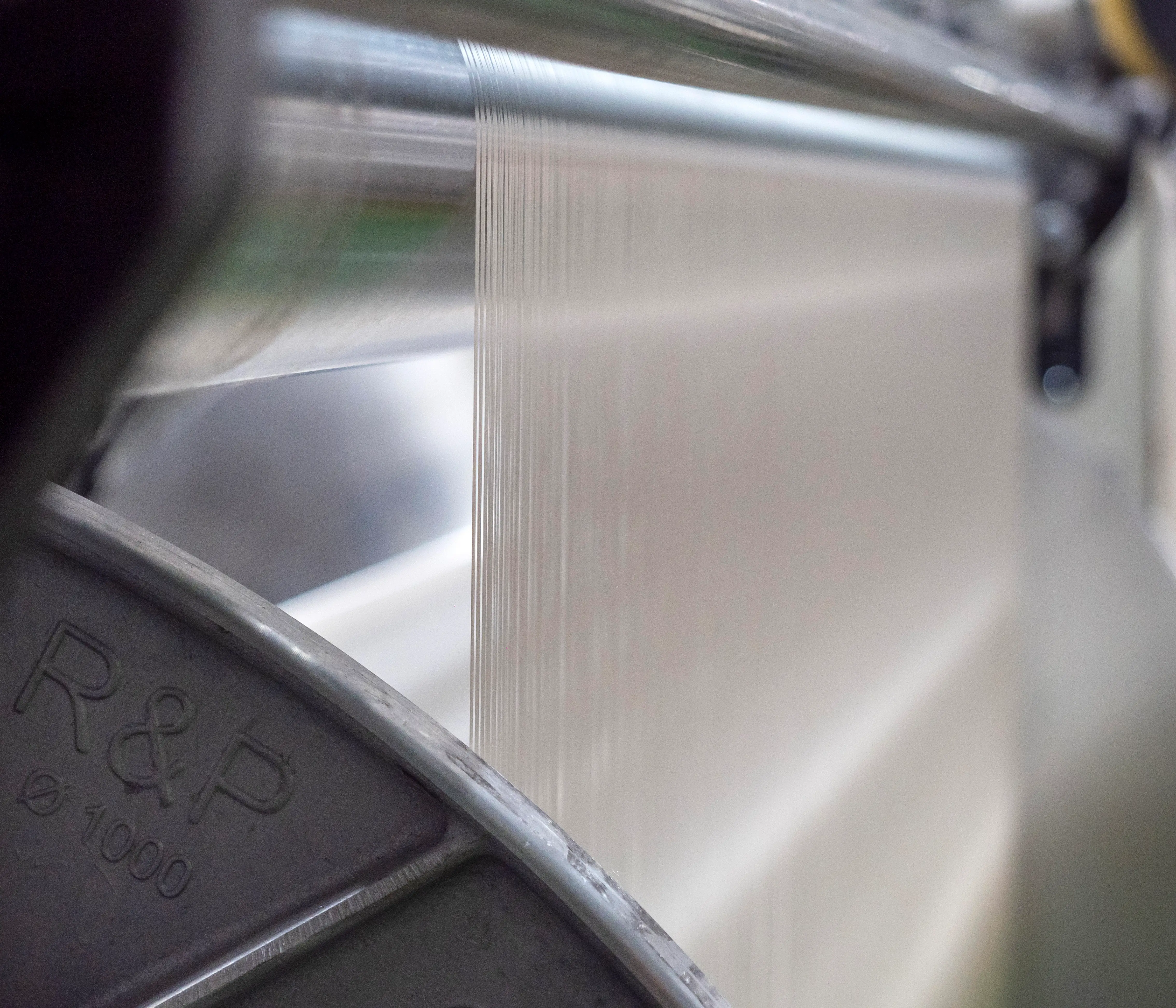 High-precision loom in motion at the Puig Ubach facility